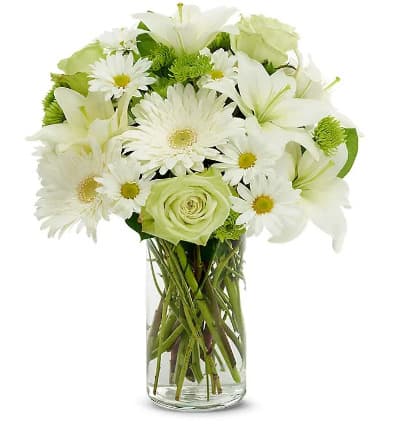 * Green Roses
* White Gerbera Daisies
* White Daisy Poms
* Clear Glass Vase