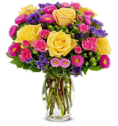 * Hot Pink Roses
* Yellow Roses
* Pink Aster & Purple Statice