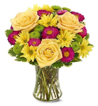 * Yellow Roses
* Hot Pink Matsumoto Asters
* Yellow Daisies
* Green Button Poms
* Clear Glass Vase