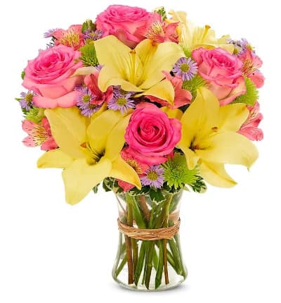 * Yellow Lilies
* Pink Roses
* Pink Alstroemeria
* Green Poms
* Purple Monte Casino