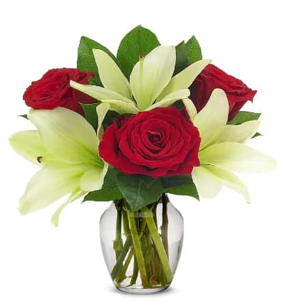 * Red Roses
* White Lilies
* Clear Glass Vase