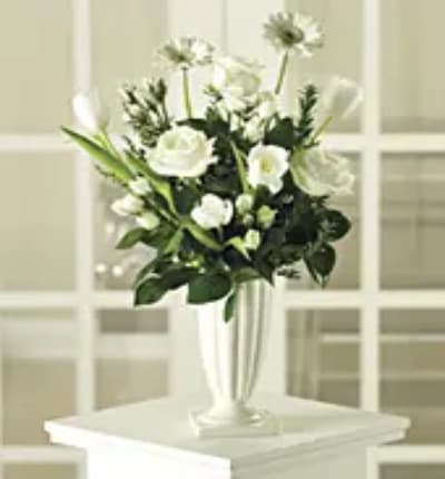 * White Roses
* White Tulips
* White Gerbera Daisies
* White Vase