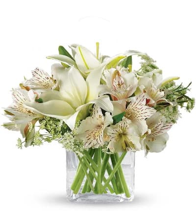 * White Lilies
* White Alstroemeria
* Queen Anne's Lace
* Glass Vase