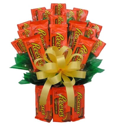 Did someone say Reese's??? Everyone's favorite chocolate and peanut butter cup is now an incredible bouquet. This all Reese's creation will surely blow their mind, and their taste buds, away! Perfect for a Get Well, Birthday, or Anniversary gift, this extra sweet candy gift will make their day extra special. The Reese's Candy Bouquet really looks like the perfect edible arrangement.