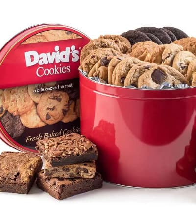 Having a party? Then this is the perfect thing for dessert! Our cookies and brownies are shipped in a David's Cookies tin and come with a complimentary greeting message. Contains approximately 32 (1.5 oz) assorted cookies and 8 (4 oz) individually wrapped assorted brownies.

Includes:
* Chocolate Chunk
* Peanut Butter
* Macadamia with White Chip
* Oatmeal Raisin
* Double Chocolate Chunk Cookies
* Assorted Brownies
* Kosher OU/D certified
* Card Message Included