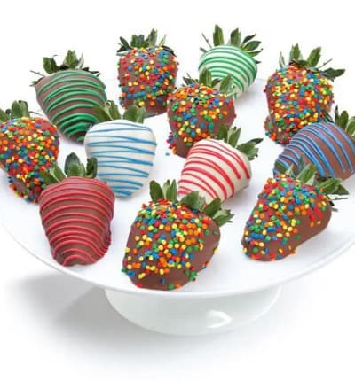 Surprise them on their special day with a delectable gift! Our premium strawberries are hand-dipped in delicious Belgian chocolate by our Artisans. Each strawberry is layered in a variety of dark, white and milk chocolate. This gourmet masterpiece is then decorated with colorful candies and a fancy chocolate drizzle, making this the perfect Birthday gift!
Includes:
* Birthday Theme
* 12 Strawberries
* Milk, White & Dark Chocolate
* Sprinkle Decorations

ALLERGEN ALERT: Product contains egg, milk, soy, wheat, peanuts, tree nuts and coconut. We recommend that those with food related allergies take the necessary precautions.