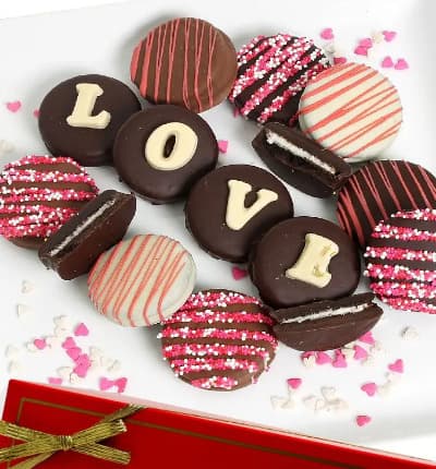 The best of the best. Belgian Chocolate beautifully covering wonderful OREOS is the perfect gift for your love. Whether it's for a Birthday, Valentine's Day, or Anniversary they will know you love them when you send them this romantic and tasty gift. LOVE Belgian Chocolate Covered OREO® Cookies - 12 Pieces.
Includes:
* Edible Love Chocolate Message
* Pink and Red Sprinkles
* Twelve Oreo Cookies
* Milk, Dark and White Chocolate.
ALLERGEN ALERT: Product contains egg, milk, soy, wheat, peanuts, tree nuts and coconut. We recommend that those with food related allergies take the necessary precautions.
