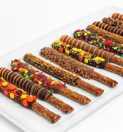 Fall is a season full of flavors. These Belgian Chocolate Dipped Pretzels are a fantastic gift for that fall birthday, back to school treat, or anniversary gift. Get ready for a season full of festivities and enjoy this delicious treat.
Includes:
* Twelve Pretzels
* Fall Sprinkles & Candies
* Milk, Dark & White Chocolate.
ALLERGEN ALERT: Product contains egg, milk, soy, wheat, peanuts, tree nuts and coconut. We recommend that those with food related allergies take the necessary precautions.
