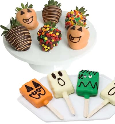 Halloween wouldn't be complete without this tasty assortment of ghosts, ghouls and pumpkins! Our delicious, fresh, crispy rice treats and scrumptious strawberries are dipped in elegant milk, dark or white chocolate, and then hand decorated with characters, sprinkles and swizzles.
Includes:
* 6 Milk, Dark and White Chocolate Covered Strawberries
* 4 Milk, Dark and White Chocolate Covered Crispy Pops
* Decorated with Halloween Themed Characters
* Elegant Gift Box.
ALLERGEN ALERT: Product contains egg, milk, soy, wheat, peanuts, tree nuts and coconut. We recommend that those with food related allergies take the necessary precautions.
