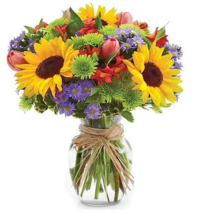 * Sunflowers
* Pink Tulips
* Red Alstroemeria
* Purple Monte Casino Asters
* Sunflower
* Green Poms