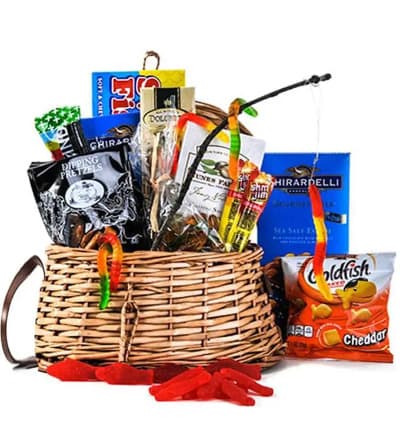 Celebrate someone you love, who loves to go fishing with this Gone Fishing Gift Basket. The gift is delivered in a woven basket with fish themed treats. From goldfish crackers to gummy worms, this fishing gift basket is a wonderful birthday or just because gift.

Includes:
* Swedish Fish
* Ghiradelli Sea Salt Chocolate Bar
* Gummy Worms
* Pepperige Farm Goldfish
* Kind Granola Bar
* Doletto Cookies
* Nunes Farm Salted Pistachios
* Eash Shore Dipped Pretzels
* Slim Jim Beef Snack Sticks
* Woven Basket