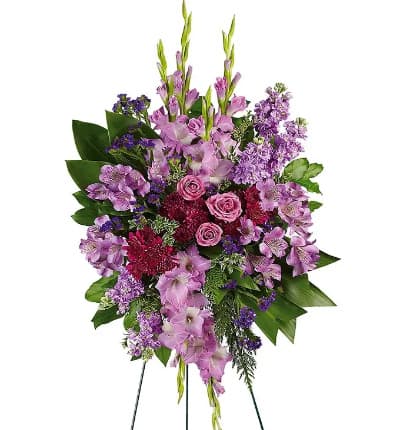 Lush spray of lavender and purple blooms. * Purple Spray Roses
* Purple Alstroemeria
* Purple Gladiolus
* Purple Cushion Mums
* Sinuata Statice